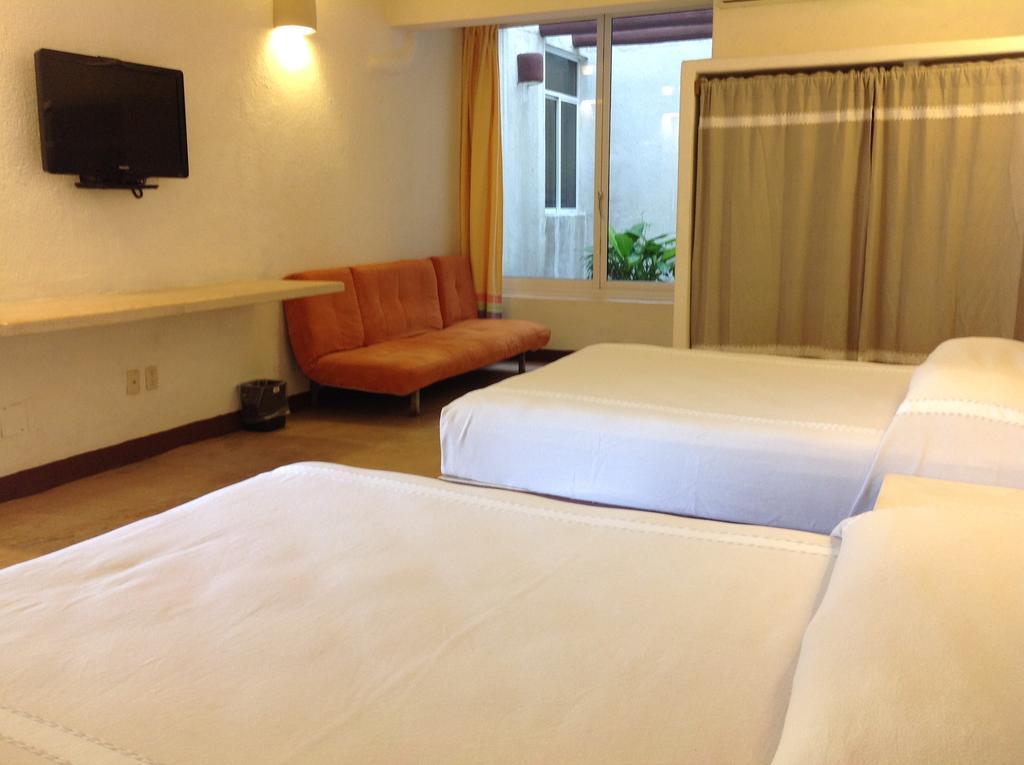Hotel Plaza Tangolunda Luaran gambar